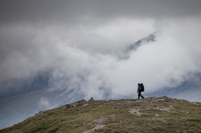 Meghan J. Ward, Artsci’07, explores a hilltop.