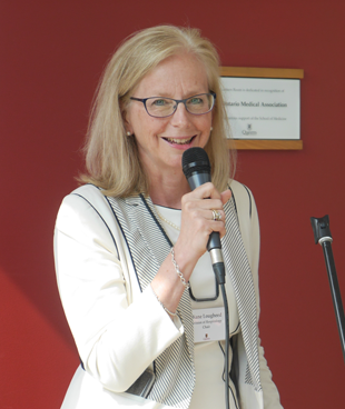 David Pattenden with photo of his late wife Ruth