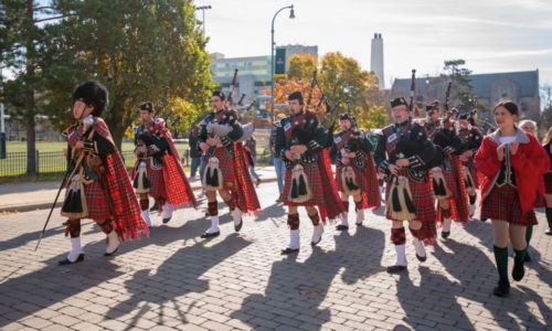 Band marching at the Alumni Parade to Richardson Stadium