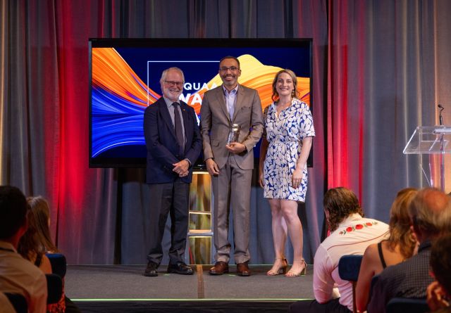 Queen’s Principal Patrick Deane and QUAA President Allison Williams present Edward Thomas with the Equity, Diversity, Inclusion, and Indigenization Alumni Award at the 2025 QUAA Awards Gala in Toronto. 