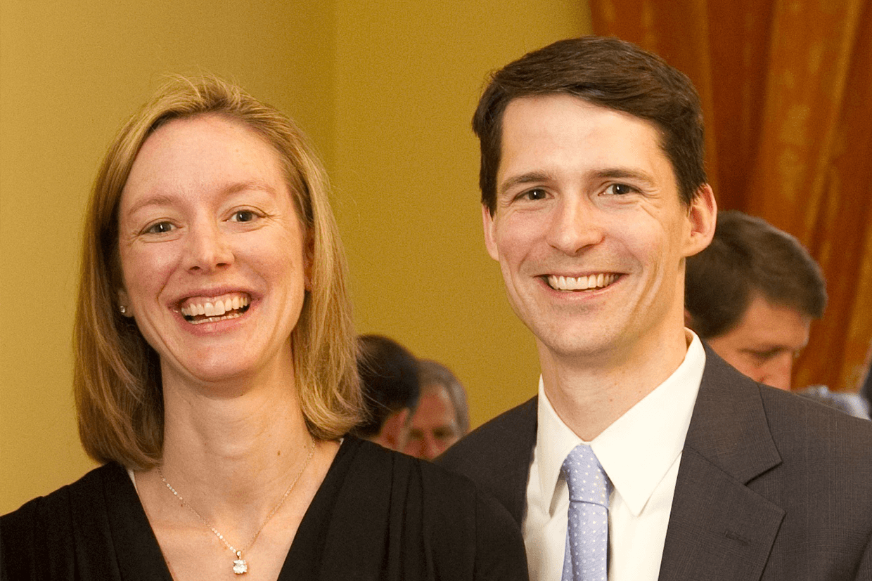 Adrienne and Ted Goldthorpe, BCom'99 smiling and wearing formal attire.