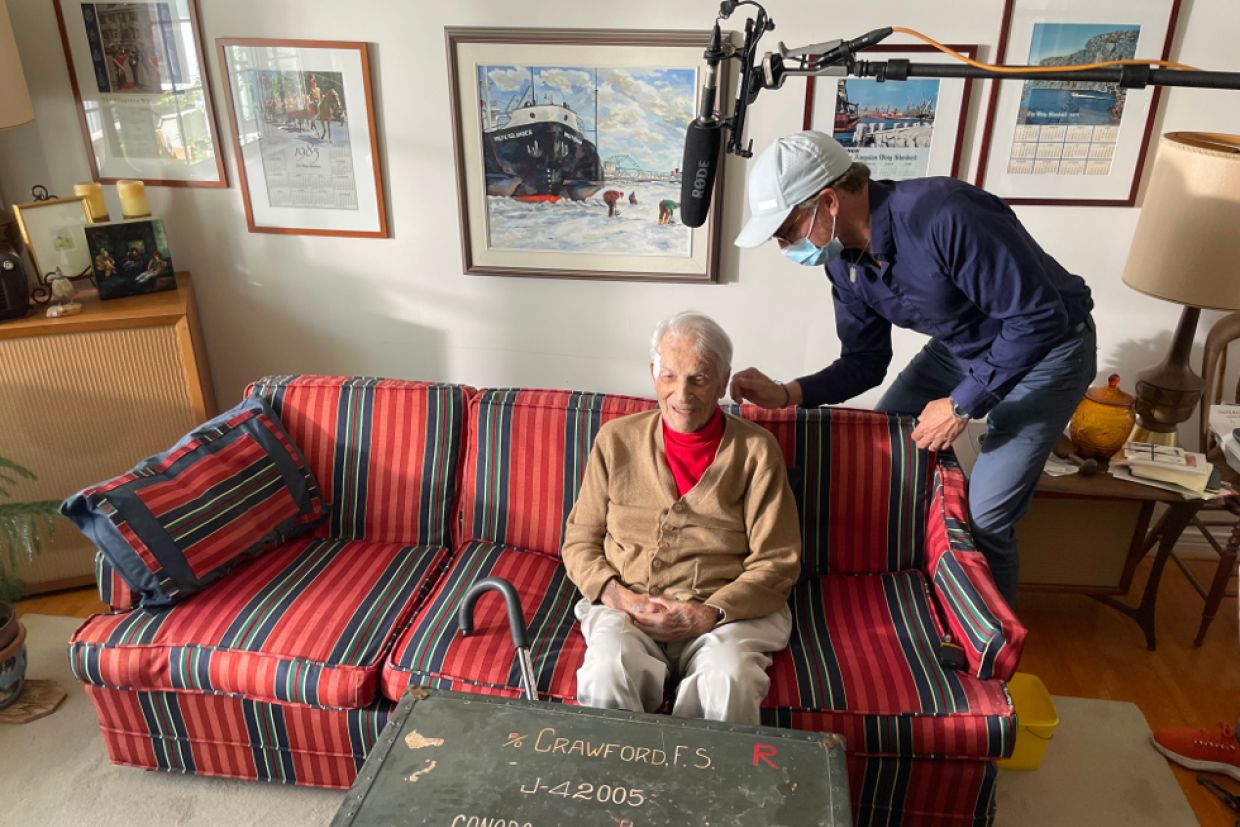 Stu Crawford sitting on a couch