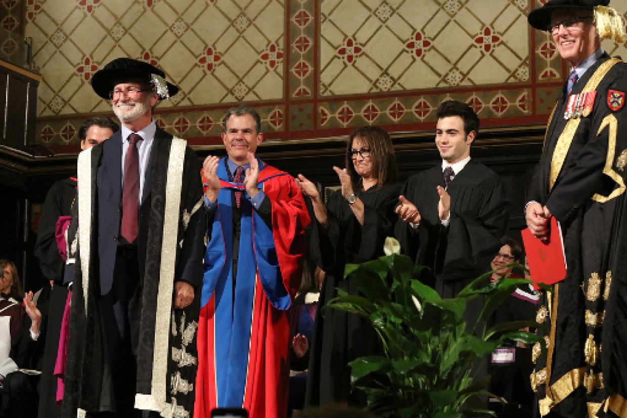 Patrick Deane on the Grant Hall stage