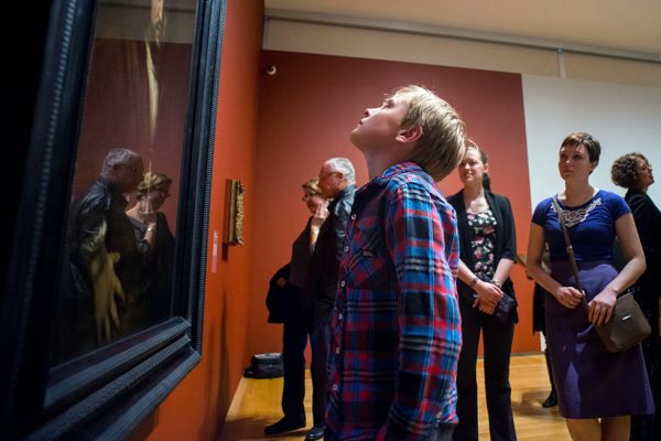 Young boy looking up at painting in the Agnes Etherington Art Gallery