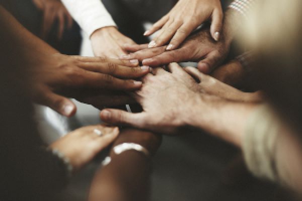 celebratory diverse hands cheering