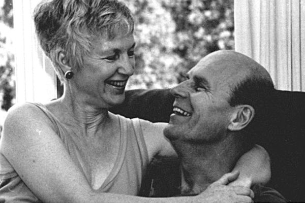 Jim Bennett, right, with wife, Barb, left smiling at each other