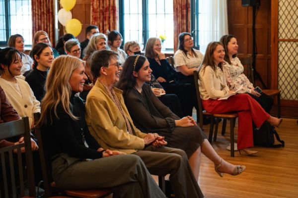 Guests sit in the audience at the Ban Righ centennial celebration.