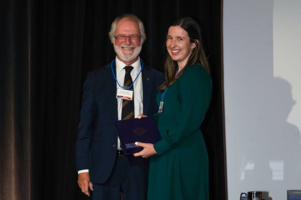Principal Patrick Dean with Heather Evans, Com'16