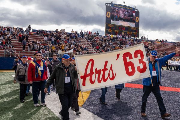Alumni walk around Richardson Stadium