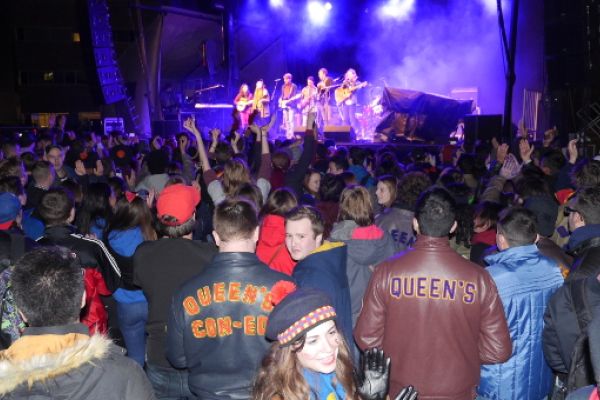 [People listen to music during ReUnion Street Festival]