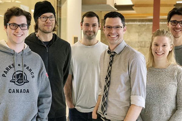 a group of researchers in a lab 