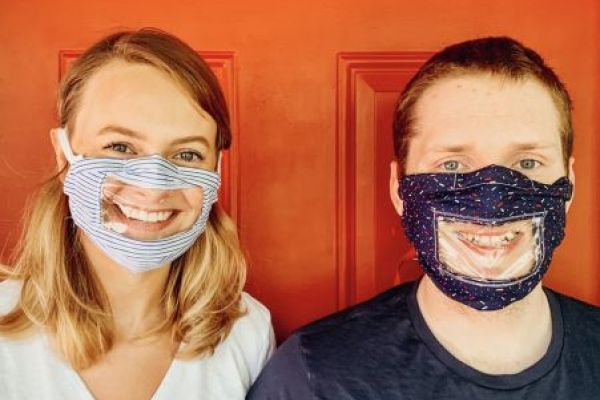 Taylor Berdell and Matt Urichuk in their masks 