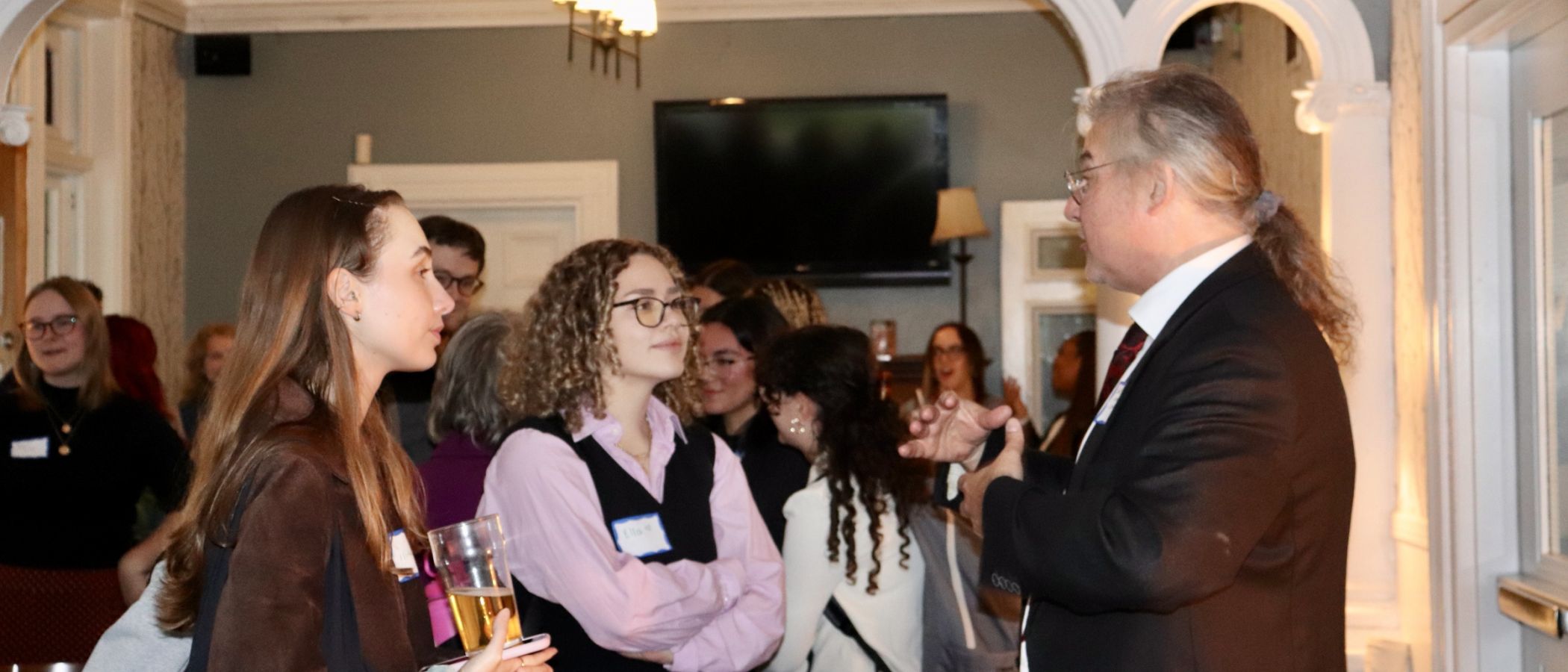 prof straker talks with students 