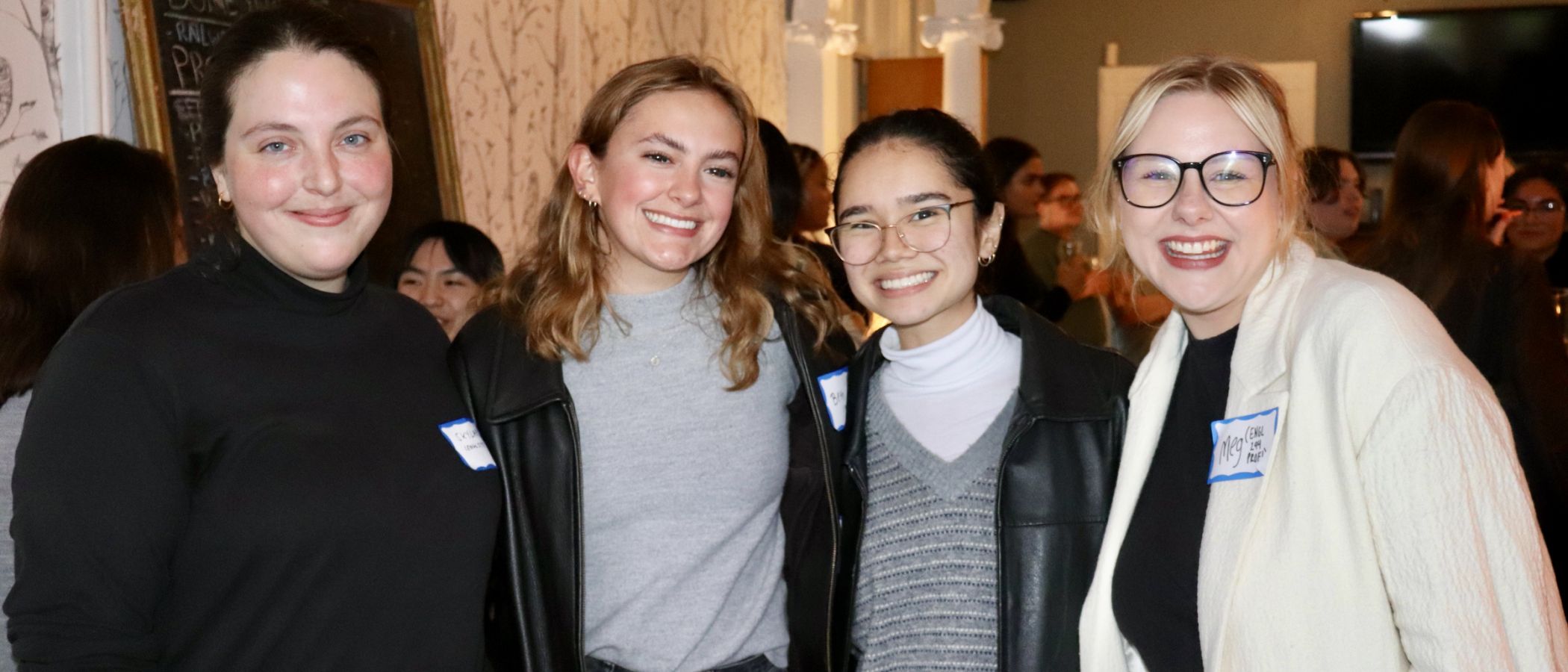 students pose with profs 