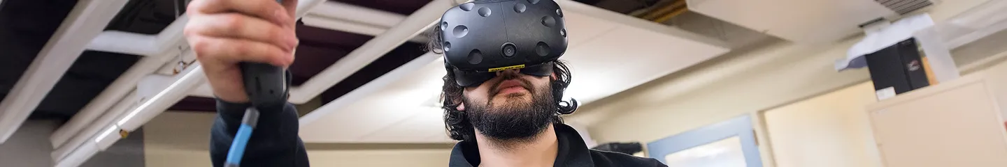 Photo of a student wearing VR equipment